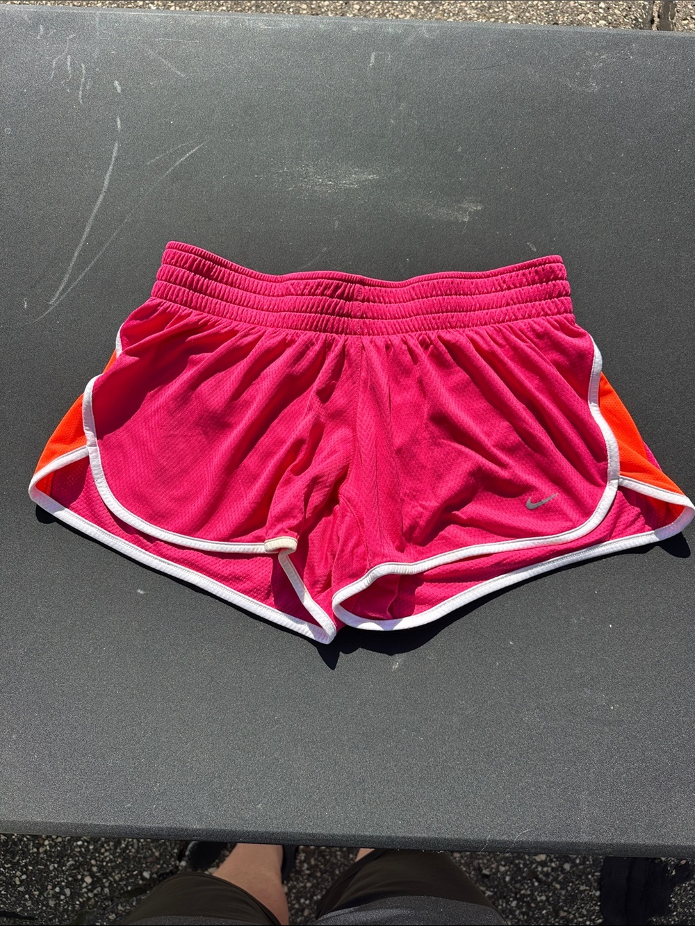 Nike Women's Pink Athletic Shorts with Orange Side Panels